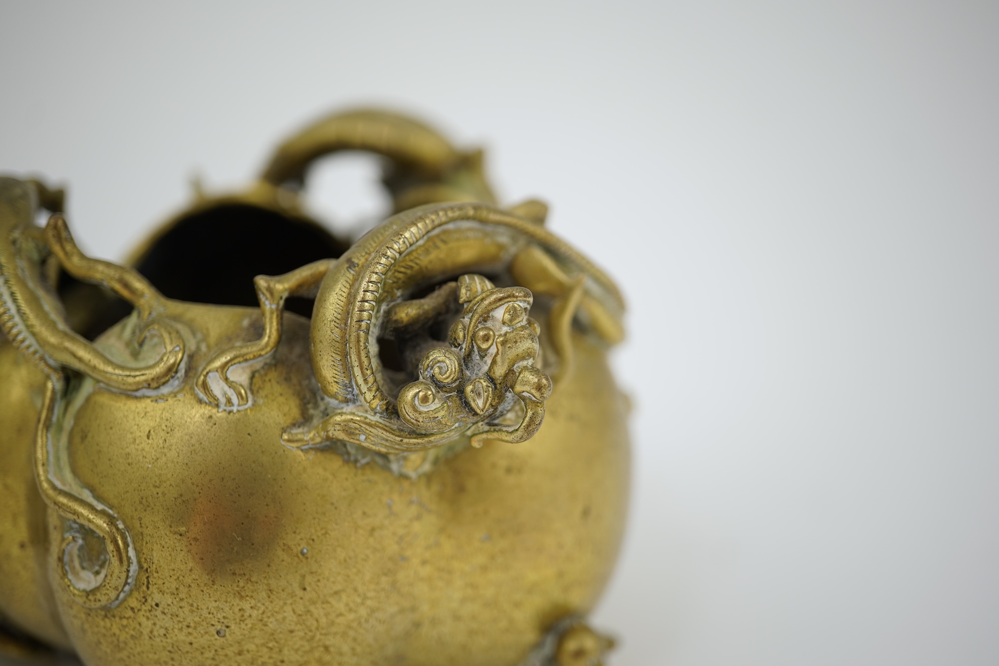 A large Chinese bronze rectangular censer and cover, Xuande seal mark, and a ‘plum blossom and chilong’ bronze censer, both 19th century